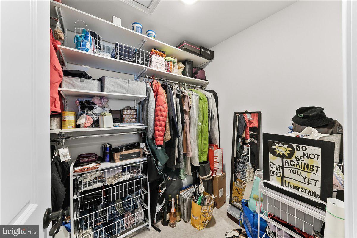 3718 Parris Boulevard Newtown Square, PA 19073 - Photo 40 of 52 a view of walk in closet with clothes and shoes