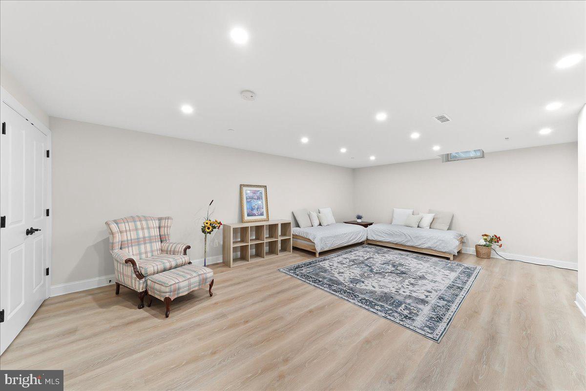 3718 Parris Boulevard Newtown Square, PA 19073 - Photo 41 of 52 a living room with furniture and a rug