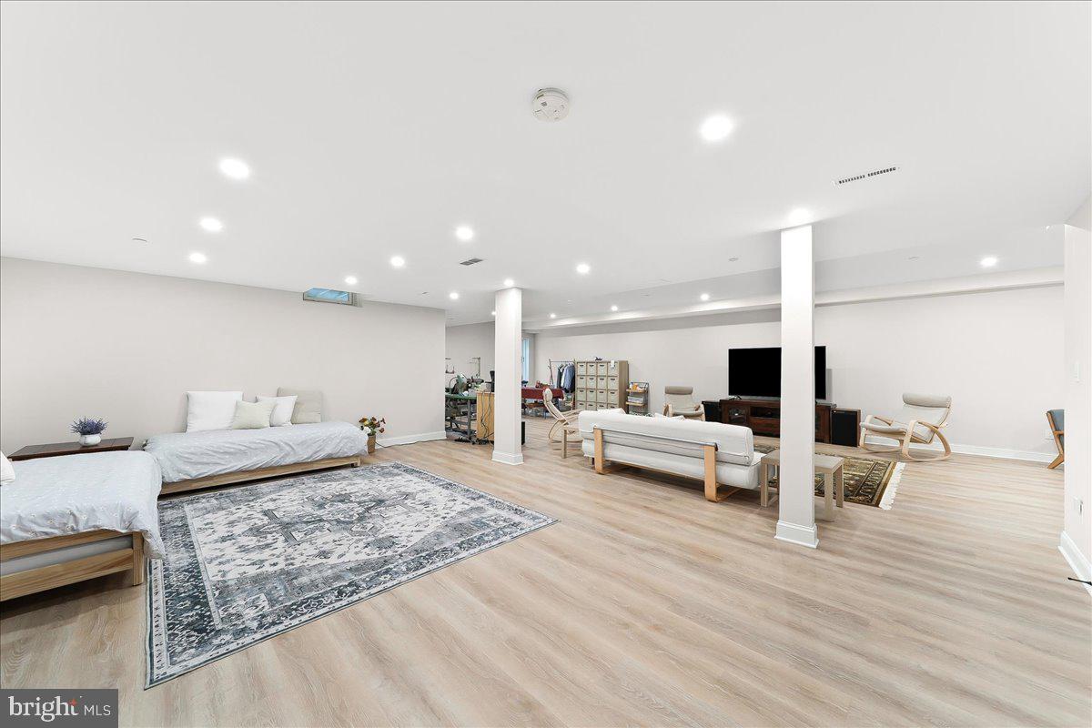 3718 Parris Boulevard Newtown Square, PA 19073 - Photo 42 of 52 a living room with furniture and kitchen view
