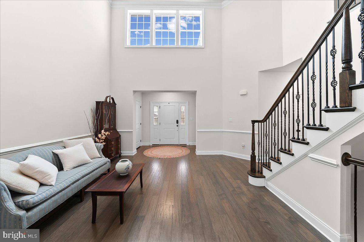 3718 Parris Boulevard Newtown Square, PA 19073 - Photo 5 of 52 a living room with furniture and a wooden floor