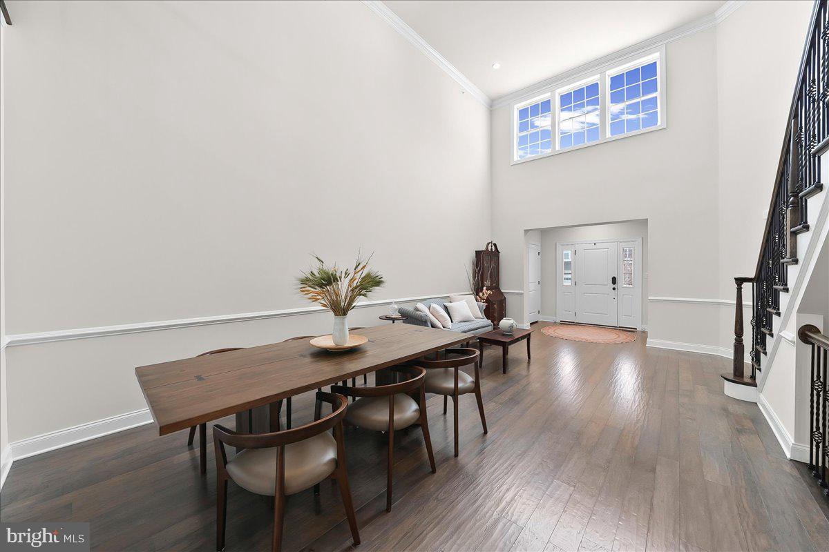 3718 Parris Boulevard Newtown Square, PA 19073 - Photo 7 of 52 a view of a dining room with furniture and wooden floor