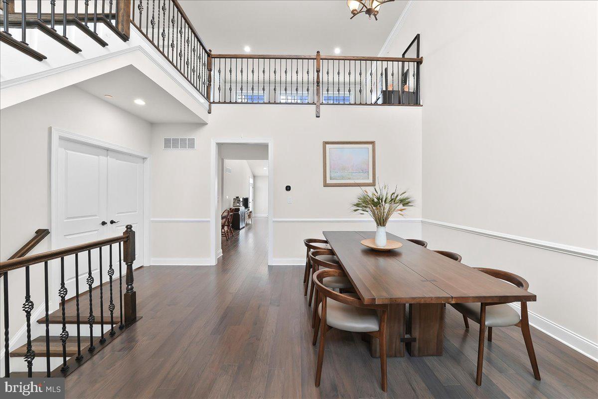 3718 Parris Boulevard Newtown Square, PA 19073 - Photo 8 of 52 a view of a dining room with furniture and wooden floor