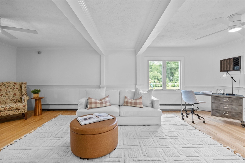 77 Bourque Road Lynnfield, MA 01940 - Photo 11 of 41 a living room with furniture and a window