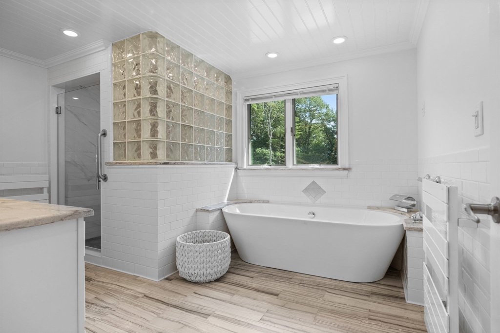 77 Bourque Road Lynnfield, MA 01940 - Photo 22 of 41 a spacious bathroom with a bathtub and window