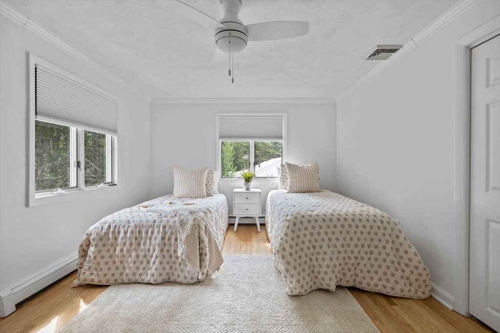 77 Bourque Road Lynnfield, MA 01940 - Photo 27 of 41 a bedroom with two beds and windows