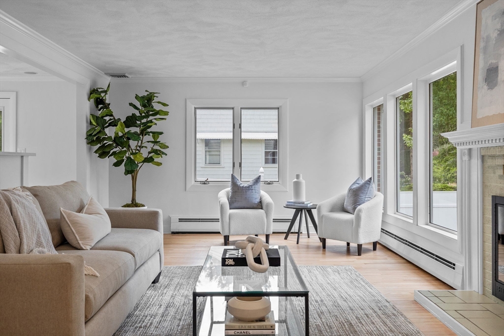 77 Bourque Road Lynnfield, MA 01940 - Photo 3 of 41 a living room with furniture and a wooden floor