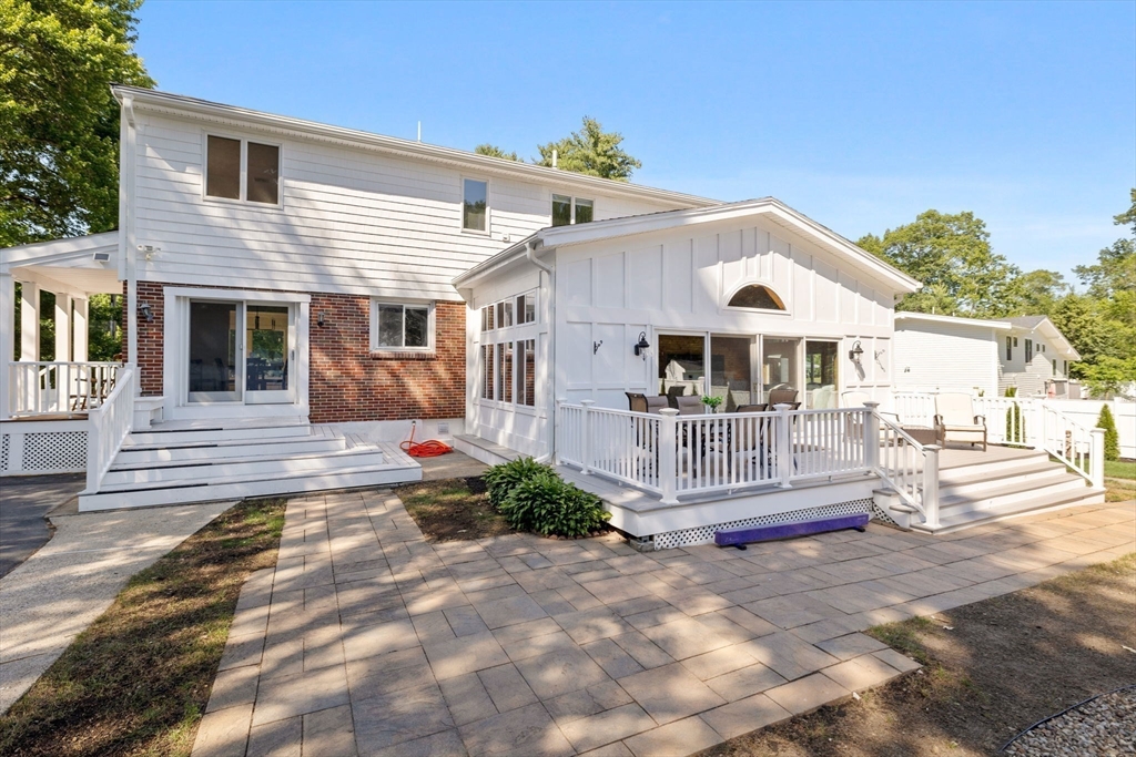 77 Bourque Road Lynnfield, MA 01940 - Photo 33 of 41 a front view of a house with a porch