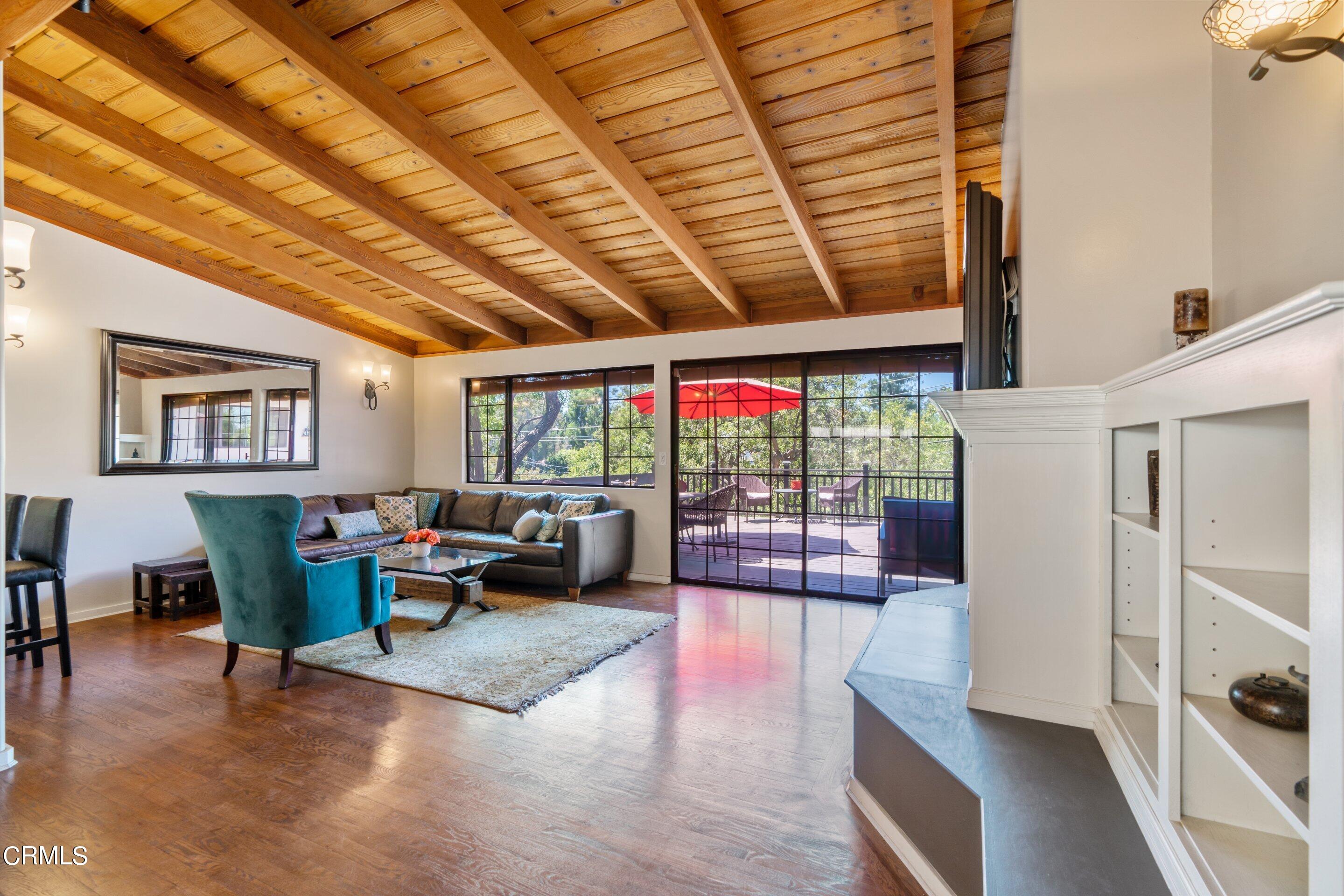 343 Cherry Drive Pasadena, CA 91105 - Photo 2 of 33 a living room with furniture and a wooden floor