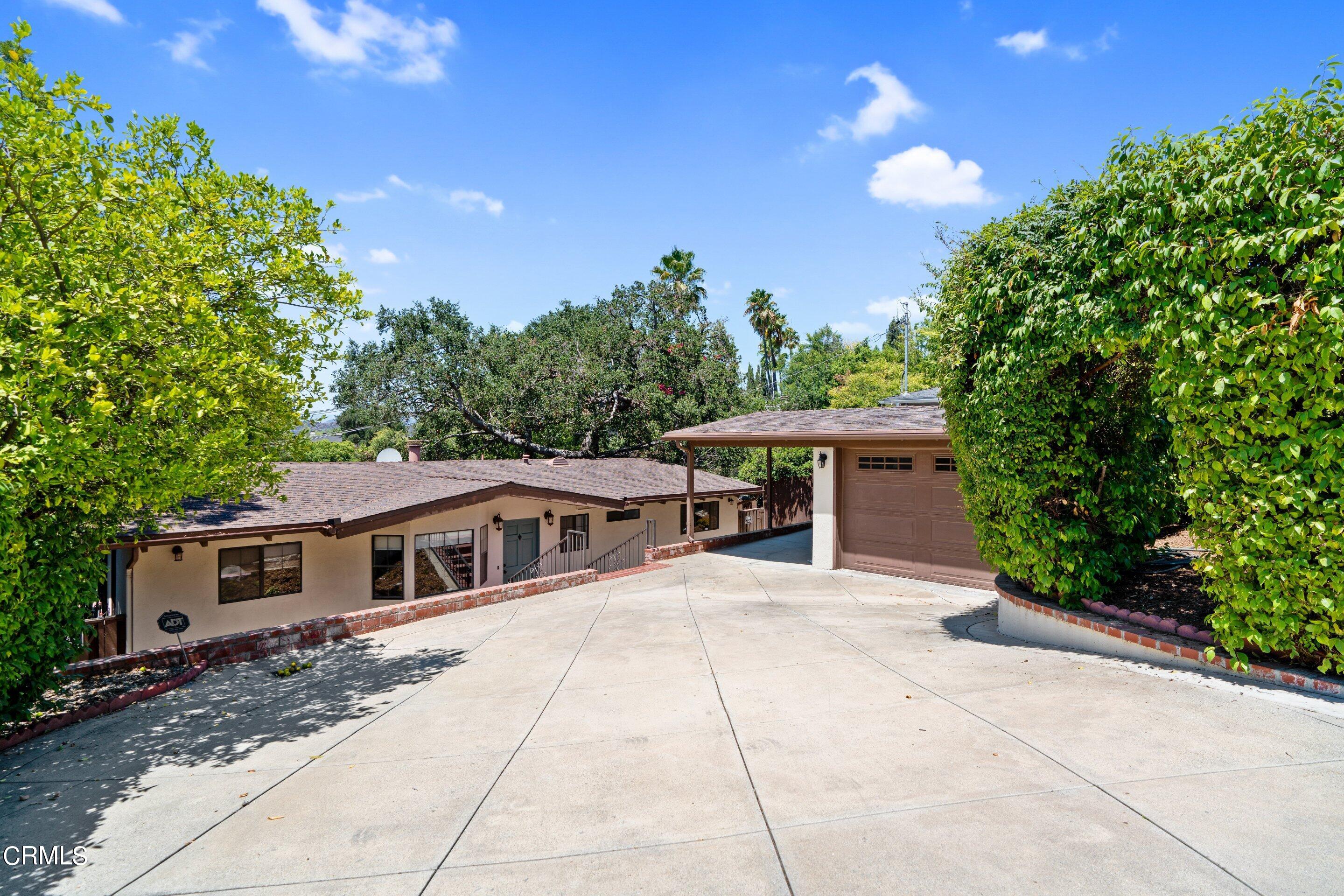 343 Cherry Drive Pasadena, CA 91105 - Photo 29 of 33 a view of house with outdoor space and trees