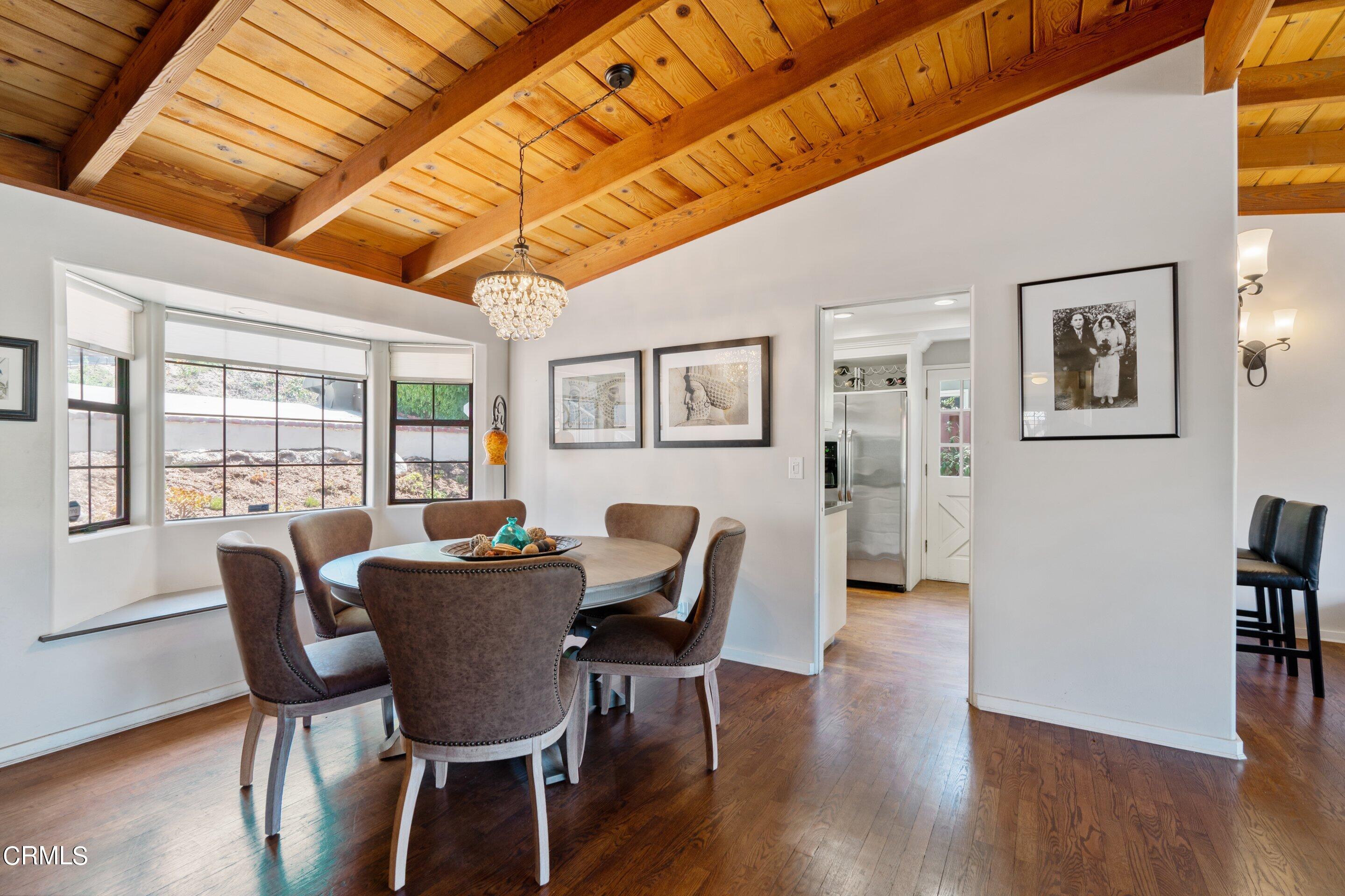 343 Cherry Drive Pasadena, CA 91105 - Photo 4 of 33 a dining room with furniture and wooden floor