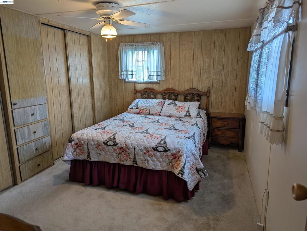 3913 Castro Valley Boulevard Castro Valley, CA 94546 - Photo 27 of 33 a bedroom with a bed dresser and a window
