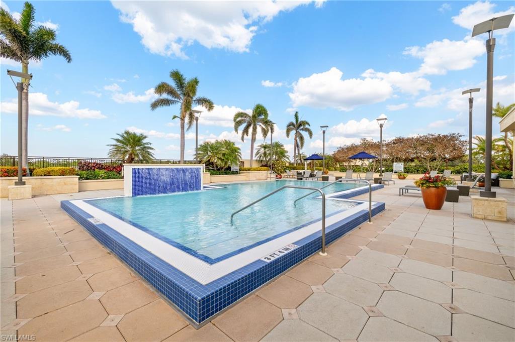 9123 Strada Place, Unit 7316 Naples, FL 34108 - Photo 34 of 47 Pool featuring a patio
