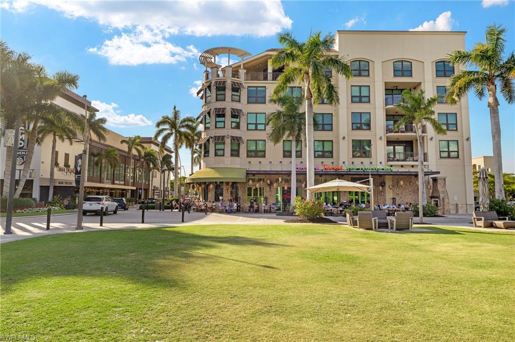 9123 Strada Place, Unit 7316 Naples, FL 34108 - Photo 4 of 47 View of home's community featuring a lawn