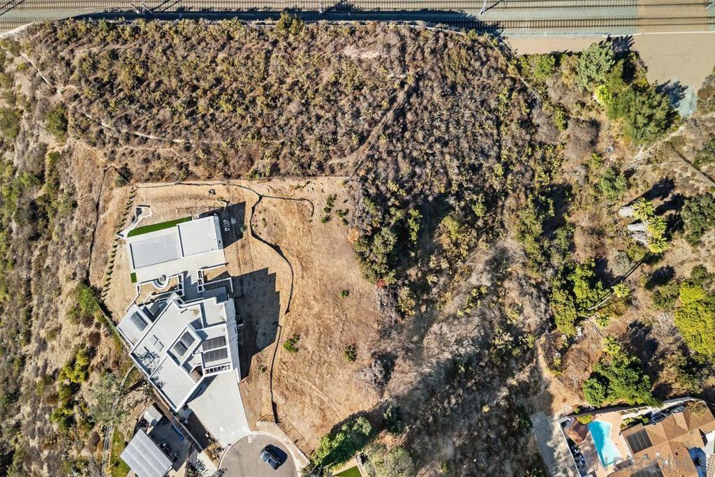 5665 Toyon Road San Diego, CA 92115 - Photo 3 of 19 view of a buildings with a tree