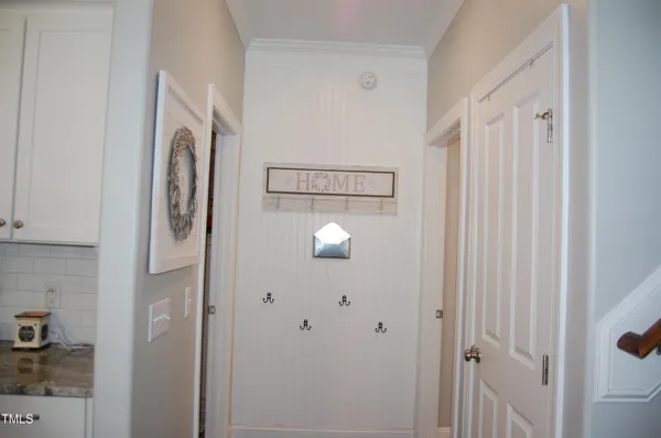 a bathroom with a granite countertop shower and a sink