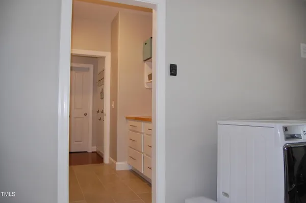 a living room with a bed and furniture