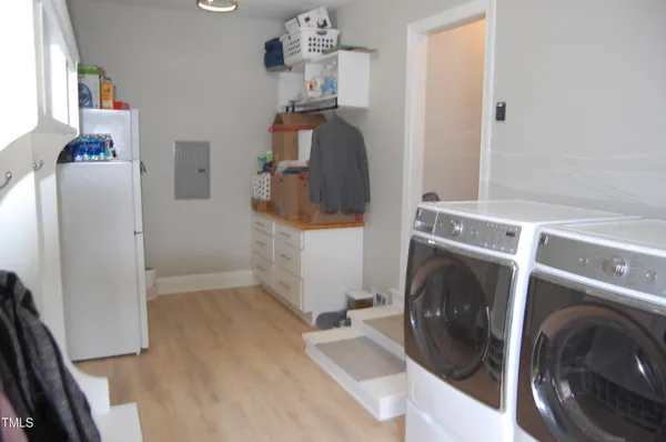 a utility room with dryer and washer