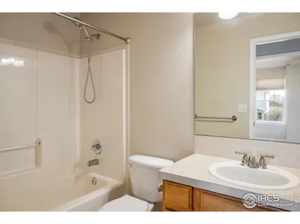 a view of a room with wooden walls