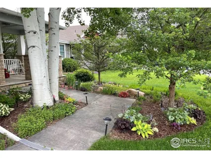 a vase of flowers are sitting on a table
