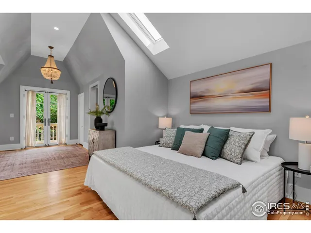 a room with a dresser and a window