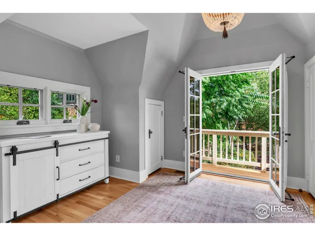 a view of a chairs and table in patio