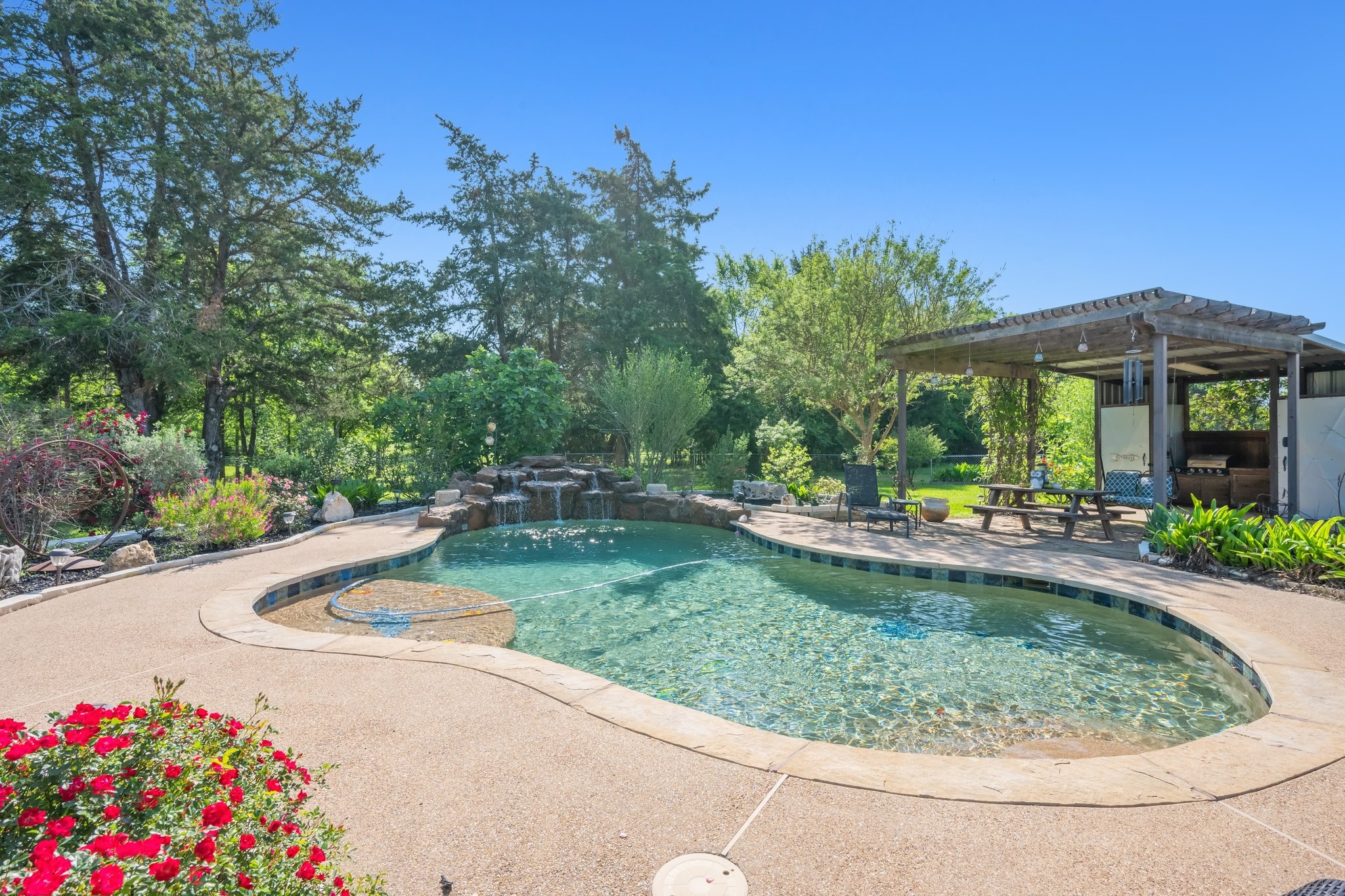 7754 Edge Cut Off Road Hearne, TX 77859 - Photo 33 of 50 a view of backyard with swimming pool and outdoor seating