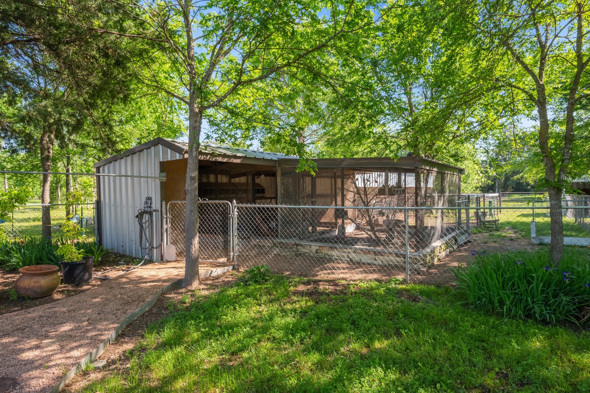 7754 Edge Cut Off Road Hearne, TX 77859 - Photo 42 of 50 a view of a backyard with a garden