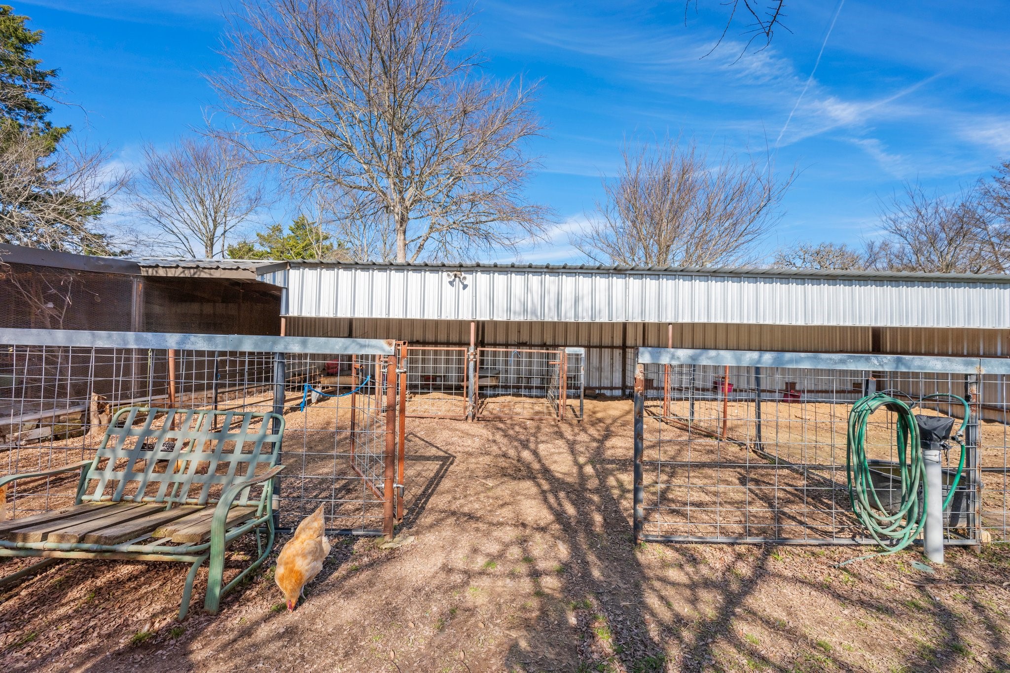 7754 Edge Cut Off Road Hearne, TX 77859 - Photo 45 of 50 a view of a swimming pool with a patio and wooden fence