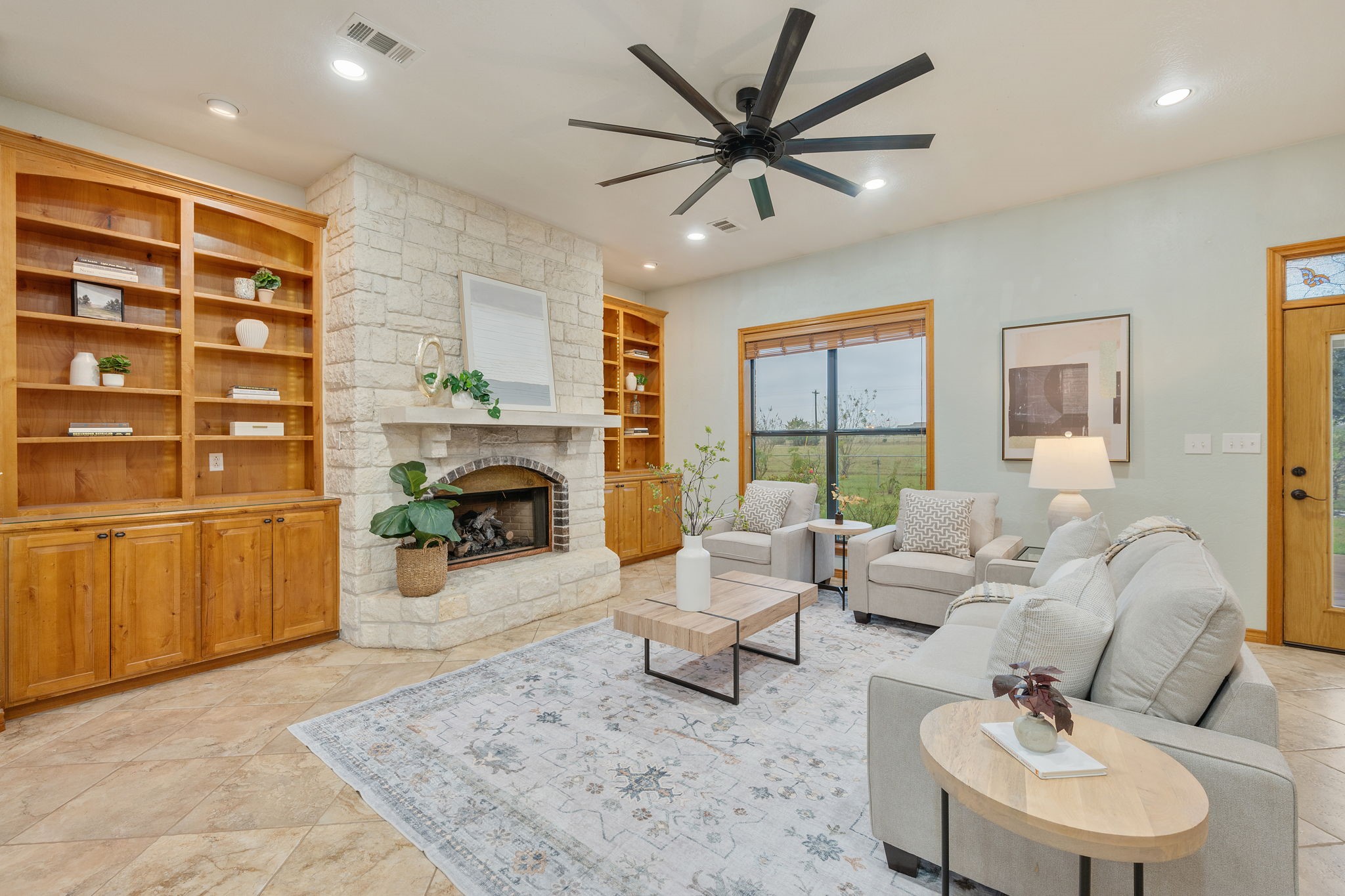7754 Edge Cut Off Road Hearne, TX 77859 - Photo 5 of 50 a living room with furniture and a fireplace