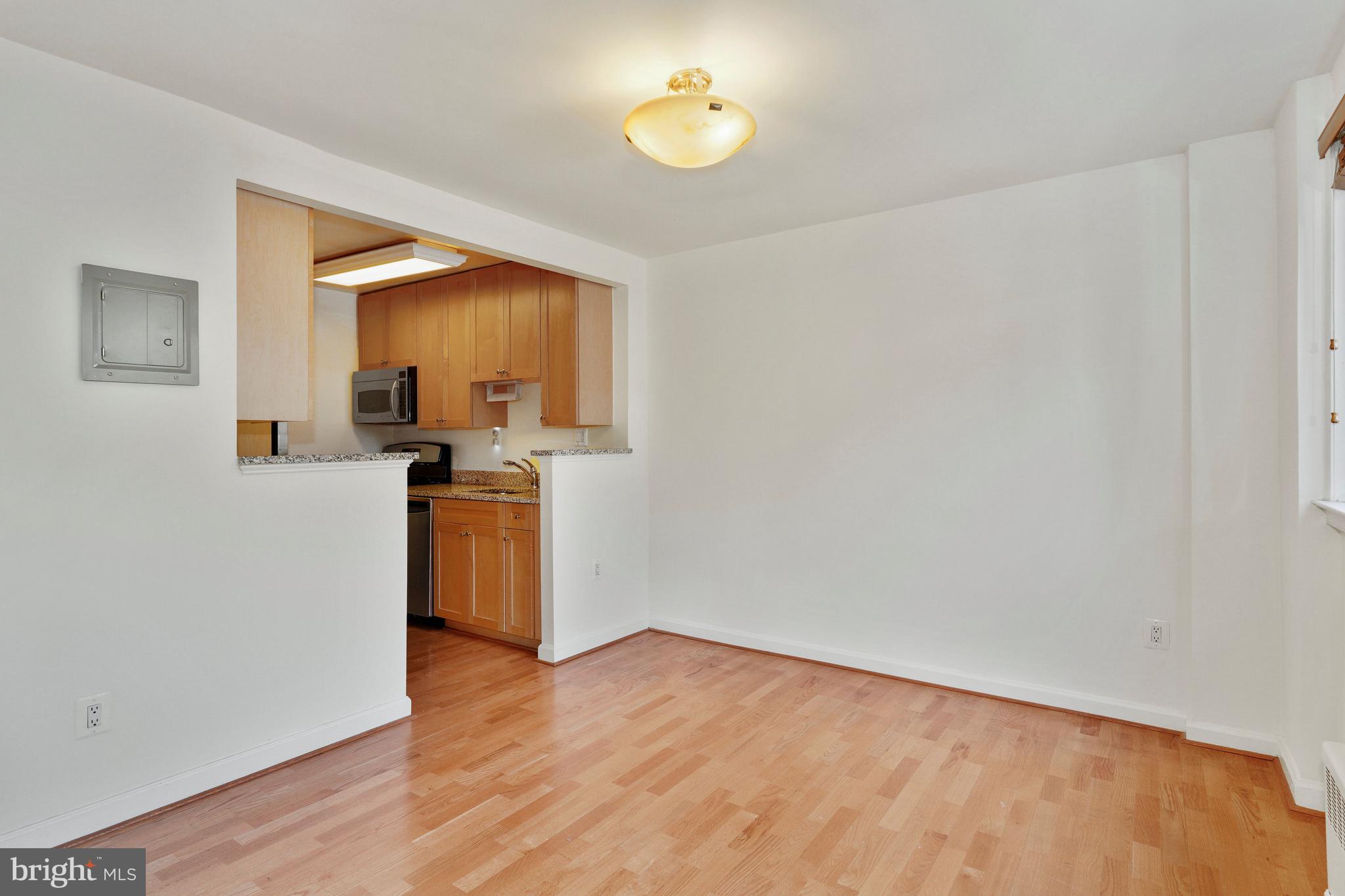 2725 39th Street Northwest, Unit 201 Washington, DC 20007 - Photo 18 of 40 View from Dining to Kitchen