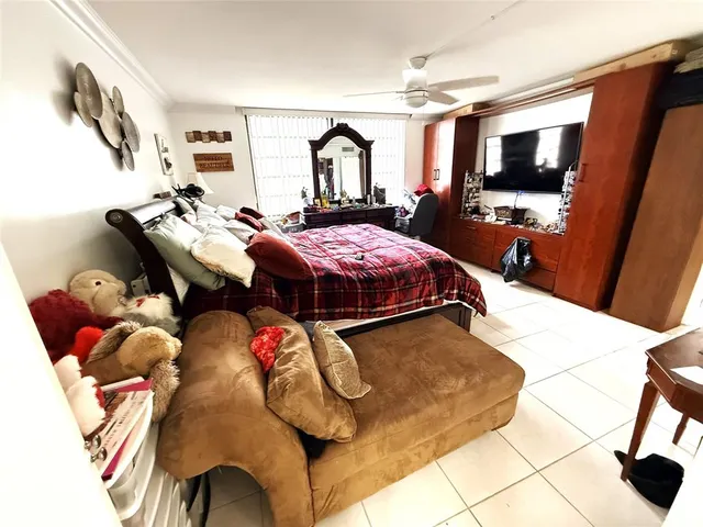 a bed room with a bed and furniture