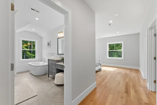 a bathroom with a toilet sink and bath tub