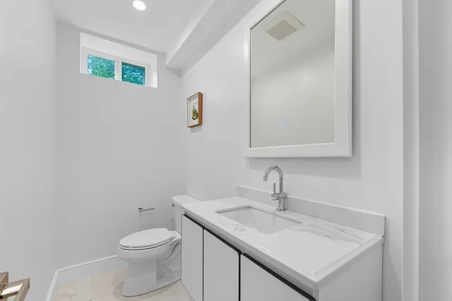 a bathroom with a sink and a toilet