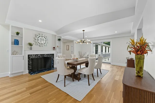 a view of a livingroom with furniture and a fireplace
