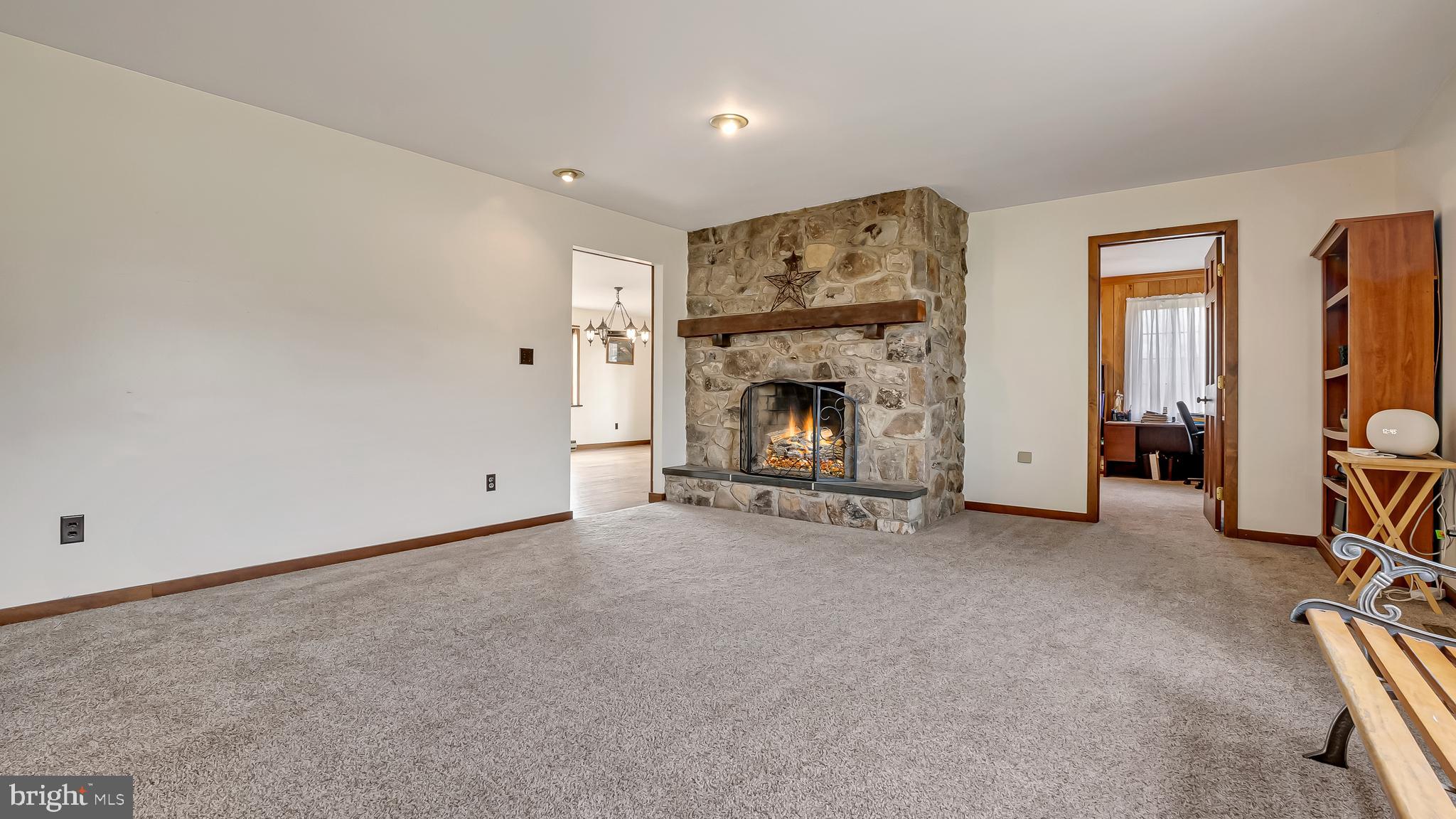 332 Blue Rocks Road Lenhartsville, PA 19534 - Photo 15 of 109 formal living w/ stone fireplace sourced locally