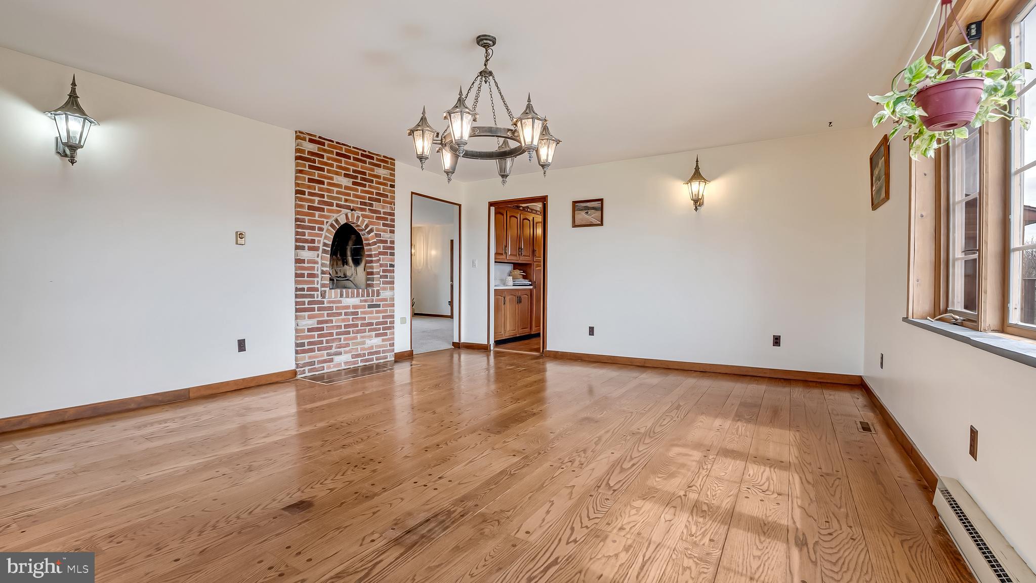 332 Blue Rocks Road Lenhartsville, PA 19534 - Photo 20 of 109 Formal dining room w/ elevated fireplace