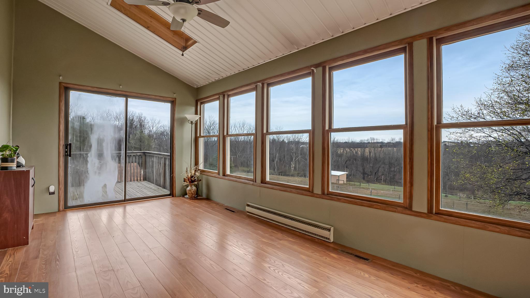 332 Blue Rocks Road Lenhartsville, PA 19534 - Photo 32 of 109 heated sunroom opens to new deck