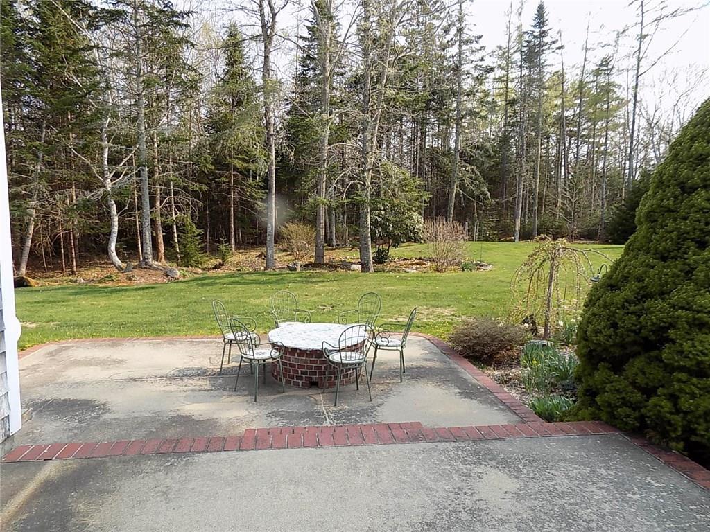 60 East Side Road Sorrento, ME 04677 - Photo 28 of 35 The back patio has a built in fire pit.