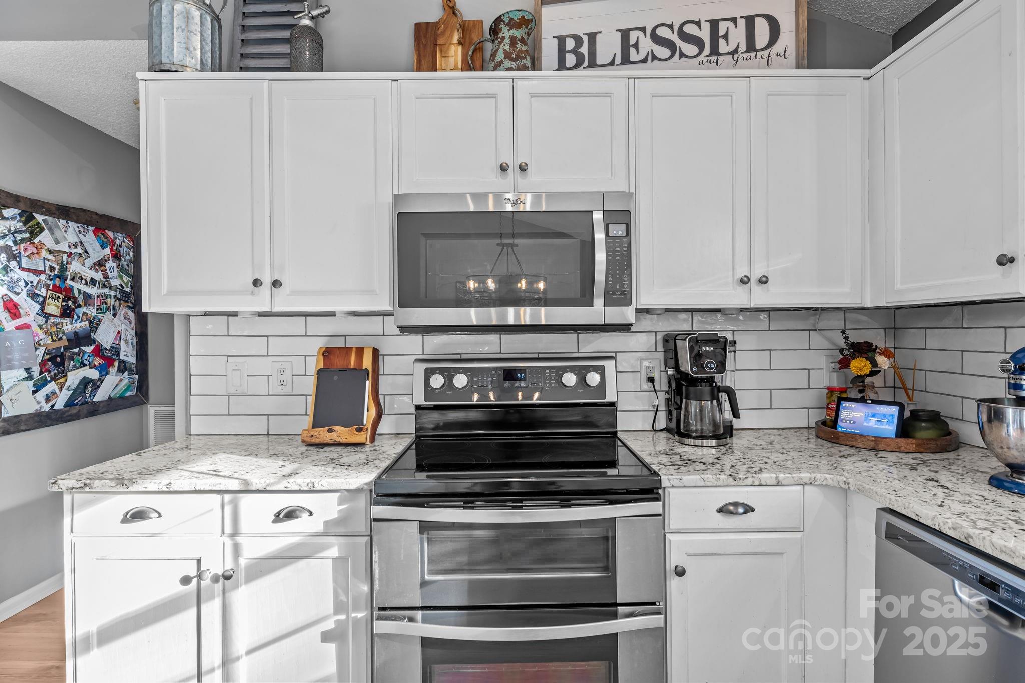 7229 Catawba Springs Road Denver, NC 28037 - Photo 15 of 48 a stove top oven sitting inside of a kitchen