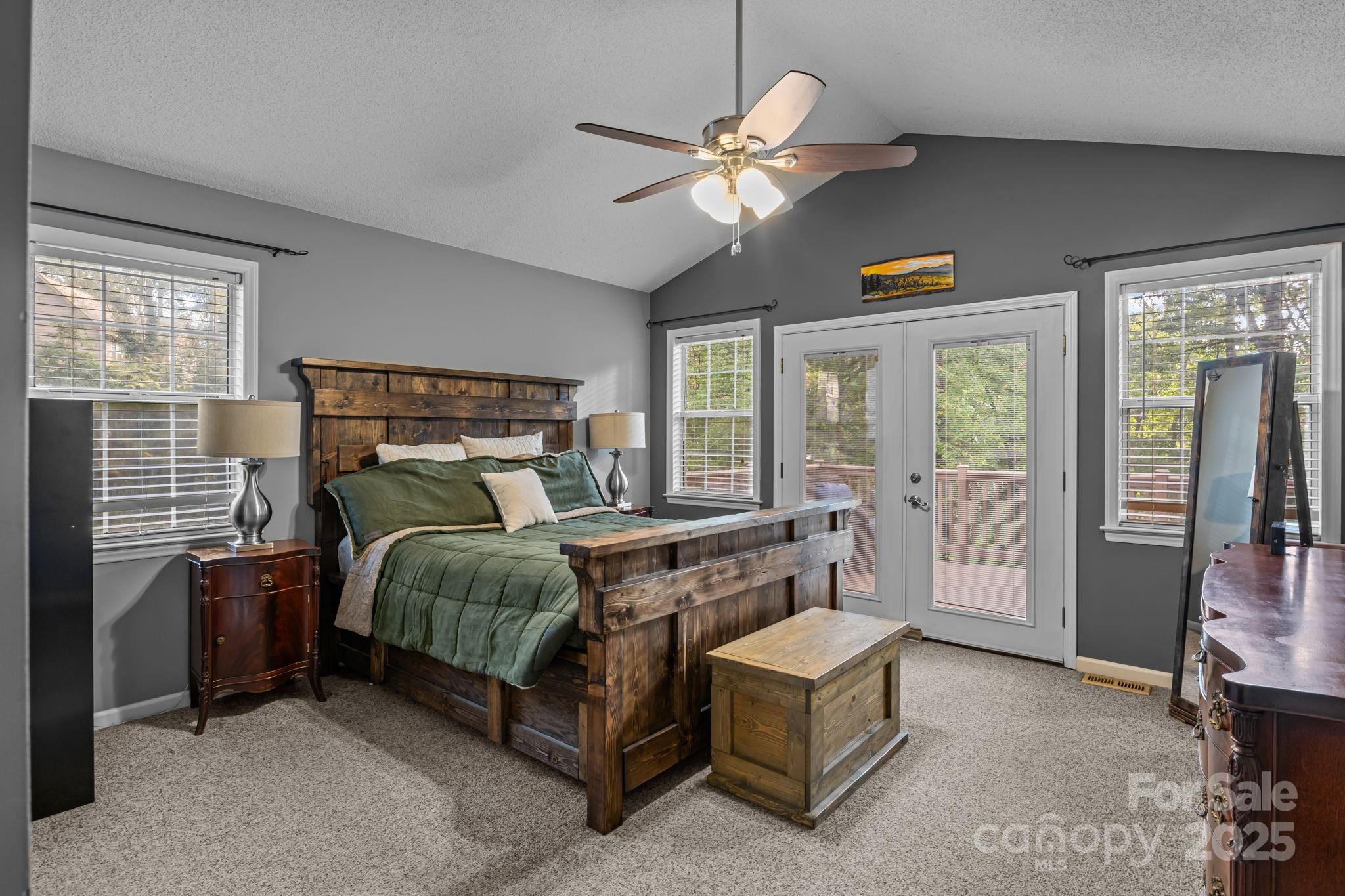 7229 Catawba Springs Road Denver, NC 28037 - Photo 26 of 48 a bed sitting in a bedroom next to a window