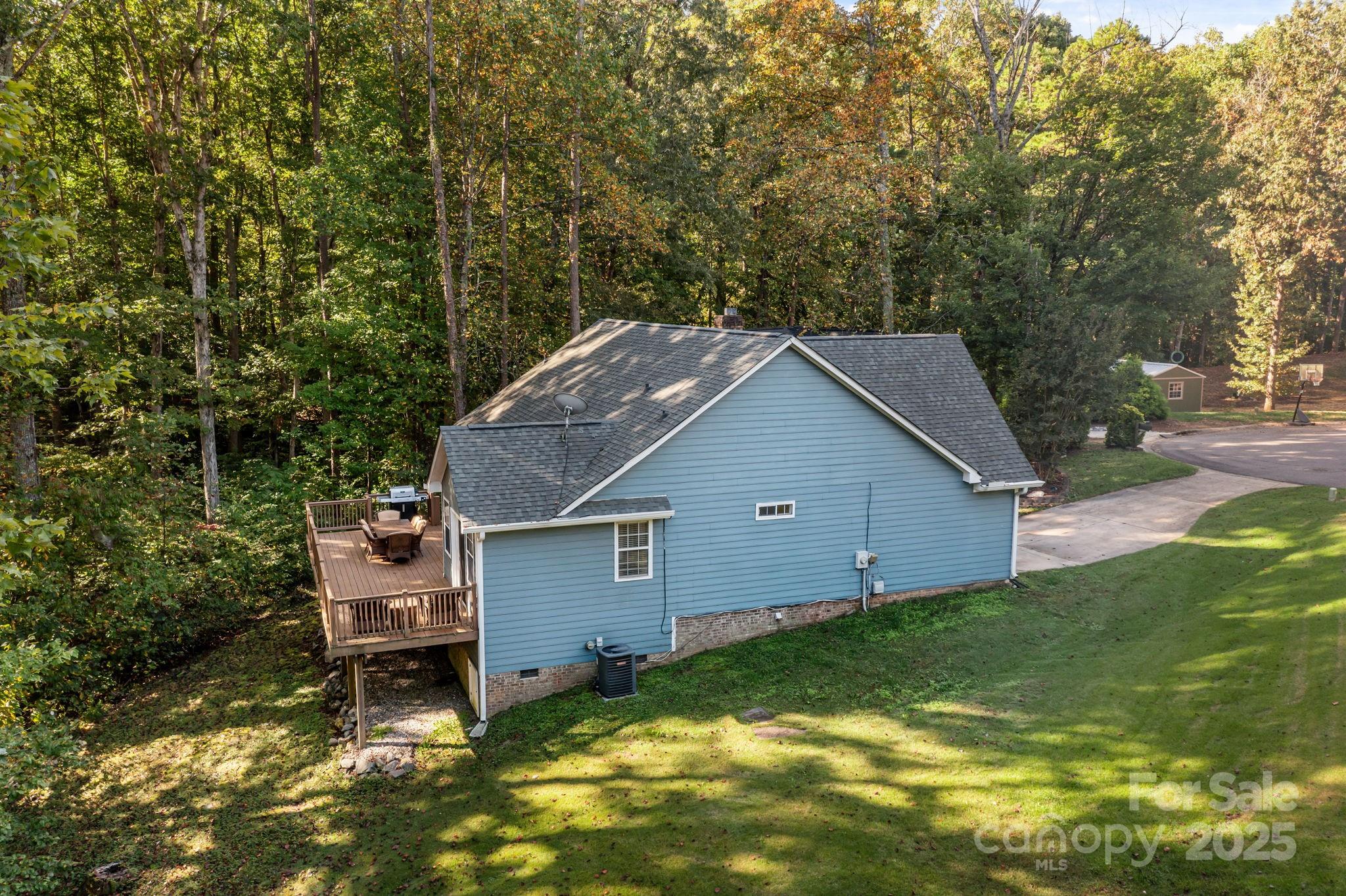 7229 Catawba Springs Road Denver, NC 28037 - Photo 44 of 48 a view of a house with a yard