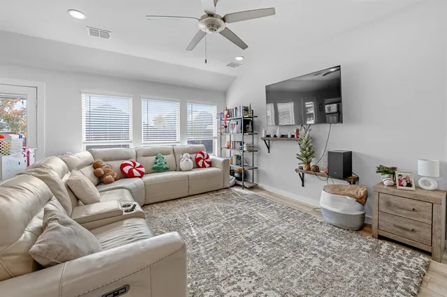 a room with toys and wooden floor