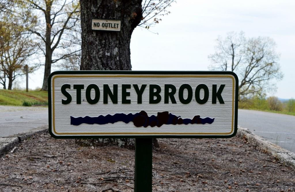0 Spring Lane, Unit 8 Columbus, NC 28722 - Photo 6 of 6 a sign on the side of the road