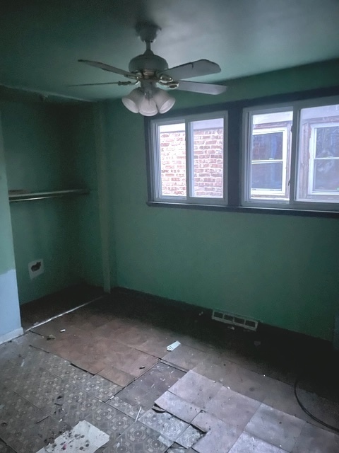 1115 West 110th Street Chicago, IL 60643 - Photo 4 of 5 an empty room with a window