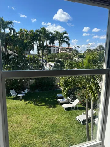 a view of a lake from a yard