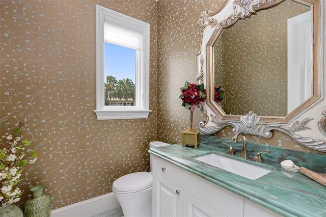 a bathroom with a bathtub and a sink