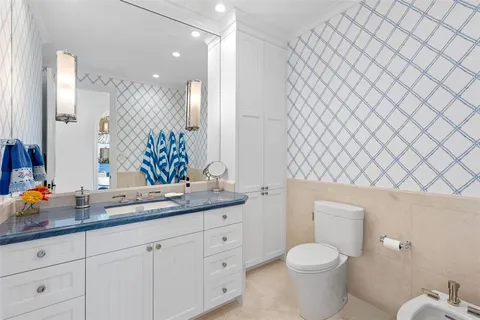 a bathroom with a bathtub and a window