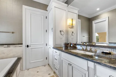 a view of a lake with couches and city view