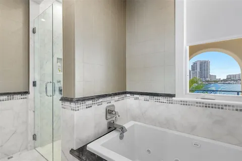 a view of a lake with a city