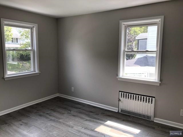 166 Carmita Avenue, Unit 2 Rutherford, NJ 07070 - Photo 9 of 27 an empty room with a window